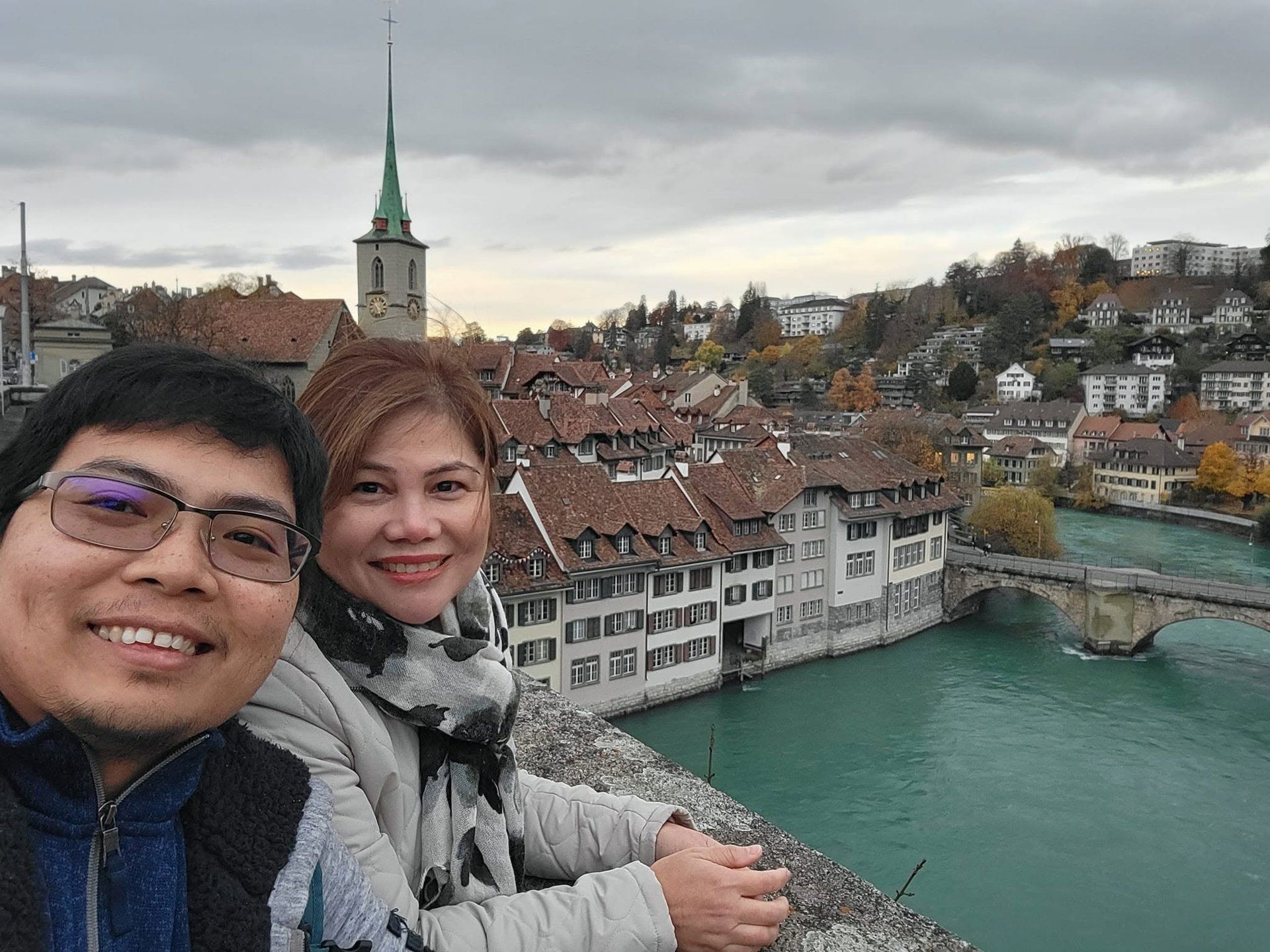 Rochelle and Nathaniel above the old town river in Switzerland